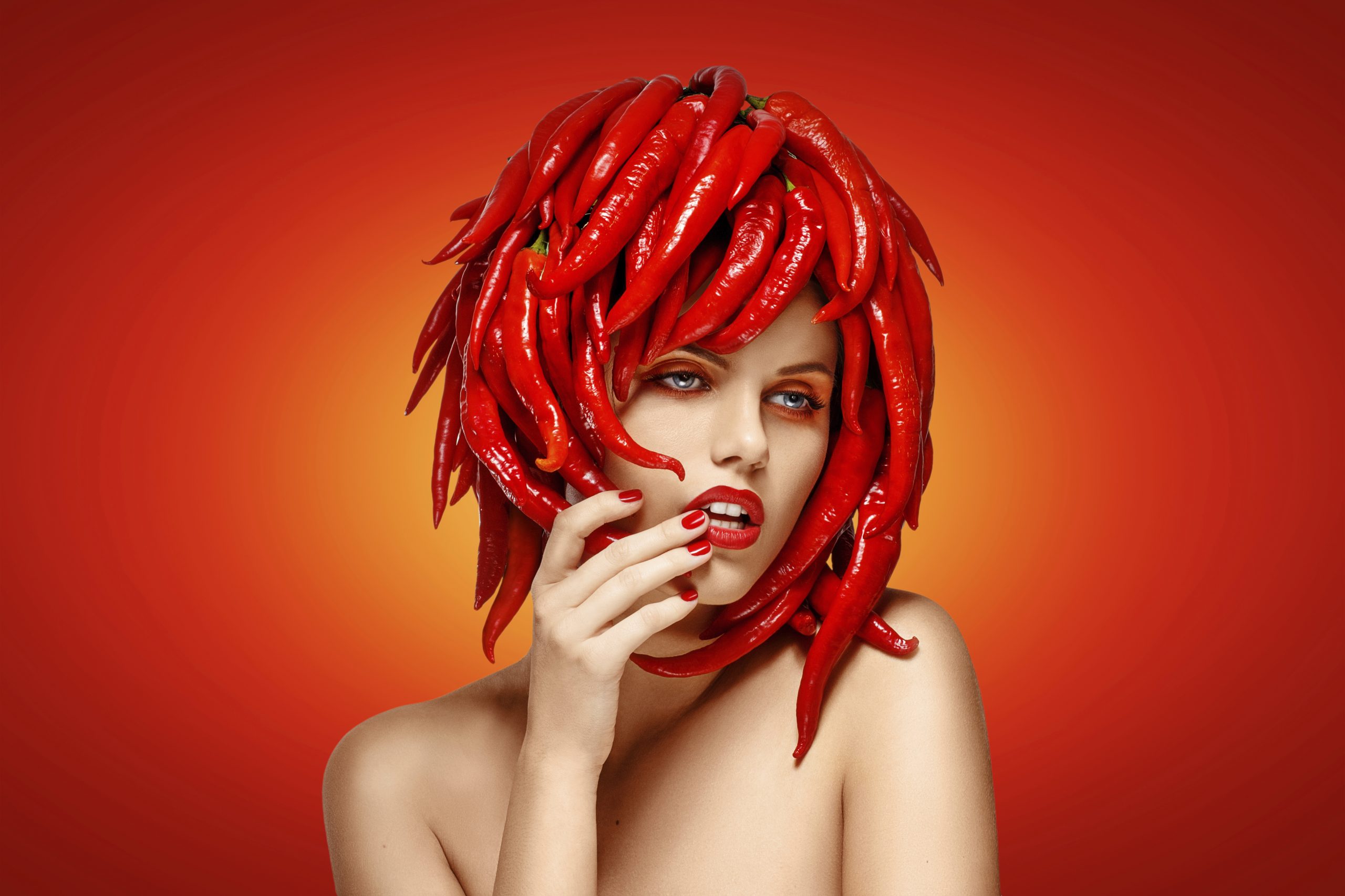 Masquerade. Fashionable Woman with Creative Hairdo - Red Chili Pepper